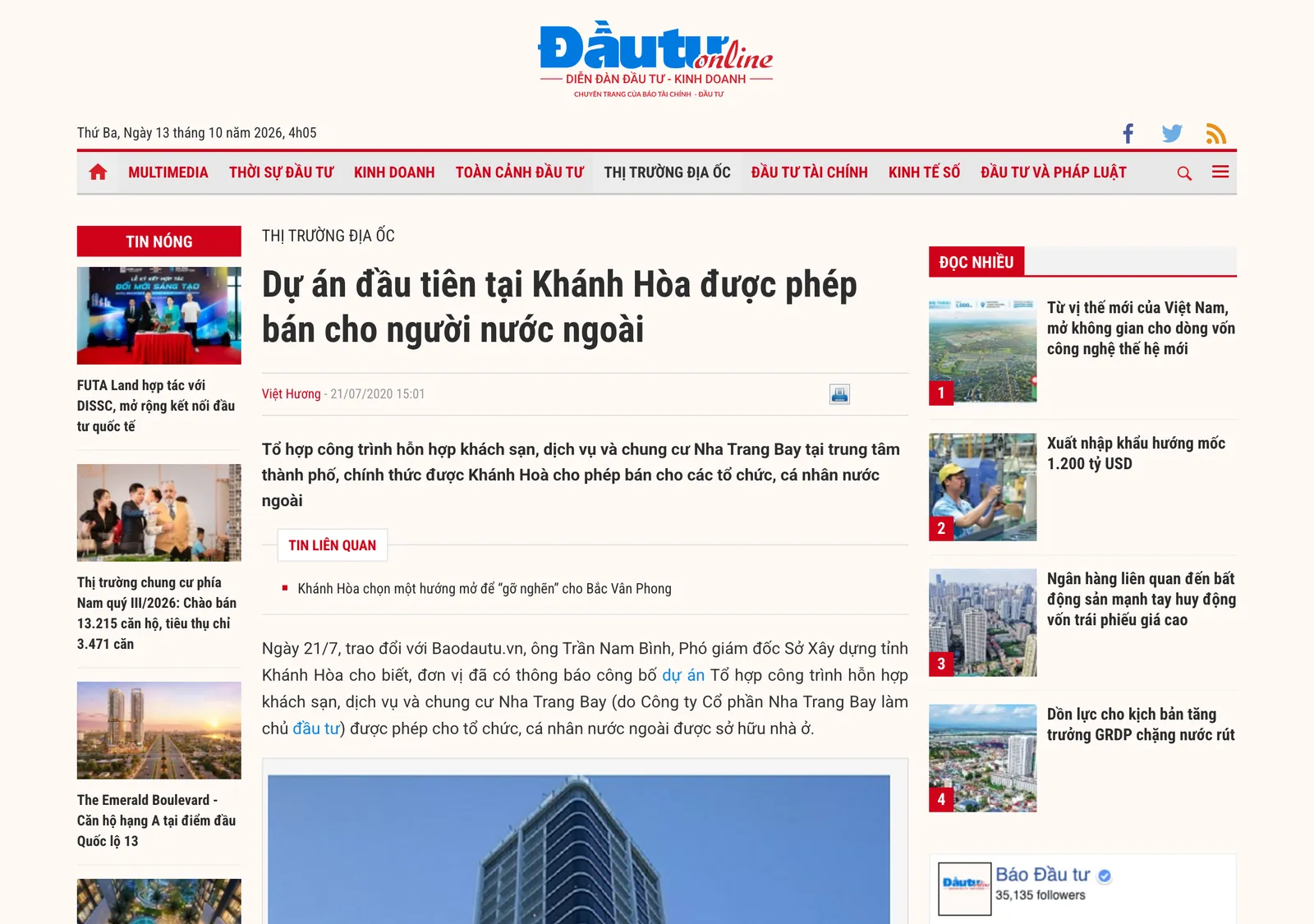 Newspaper web page with a headline about the first Khanh Hoa project open to foreign buyers and a photo of a tower