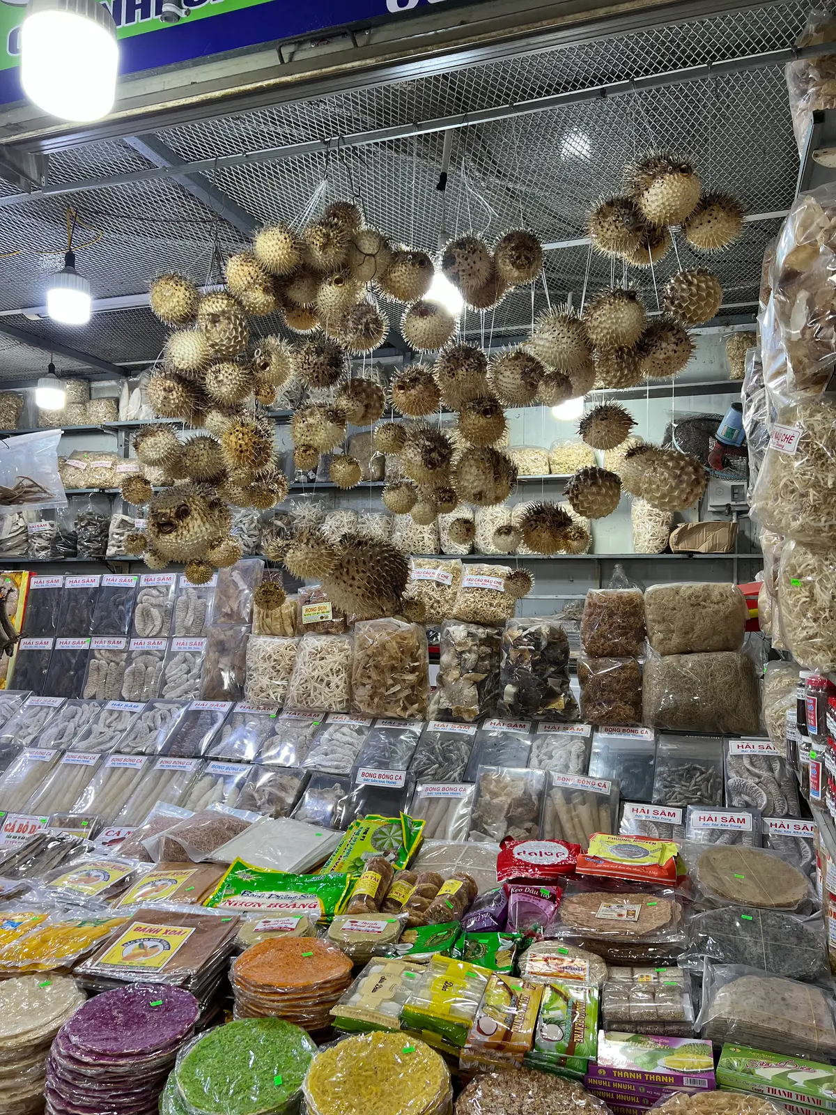 Shelves of dried puffer fish and packed dried sea products