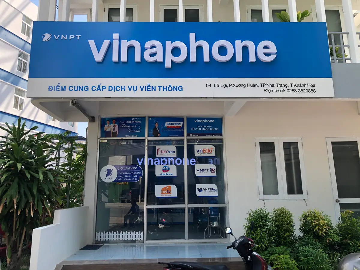 Blue VinaPhone sign above the entrance of a VNPT service point