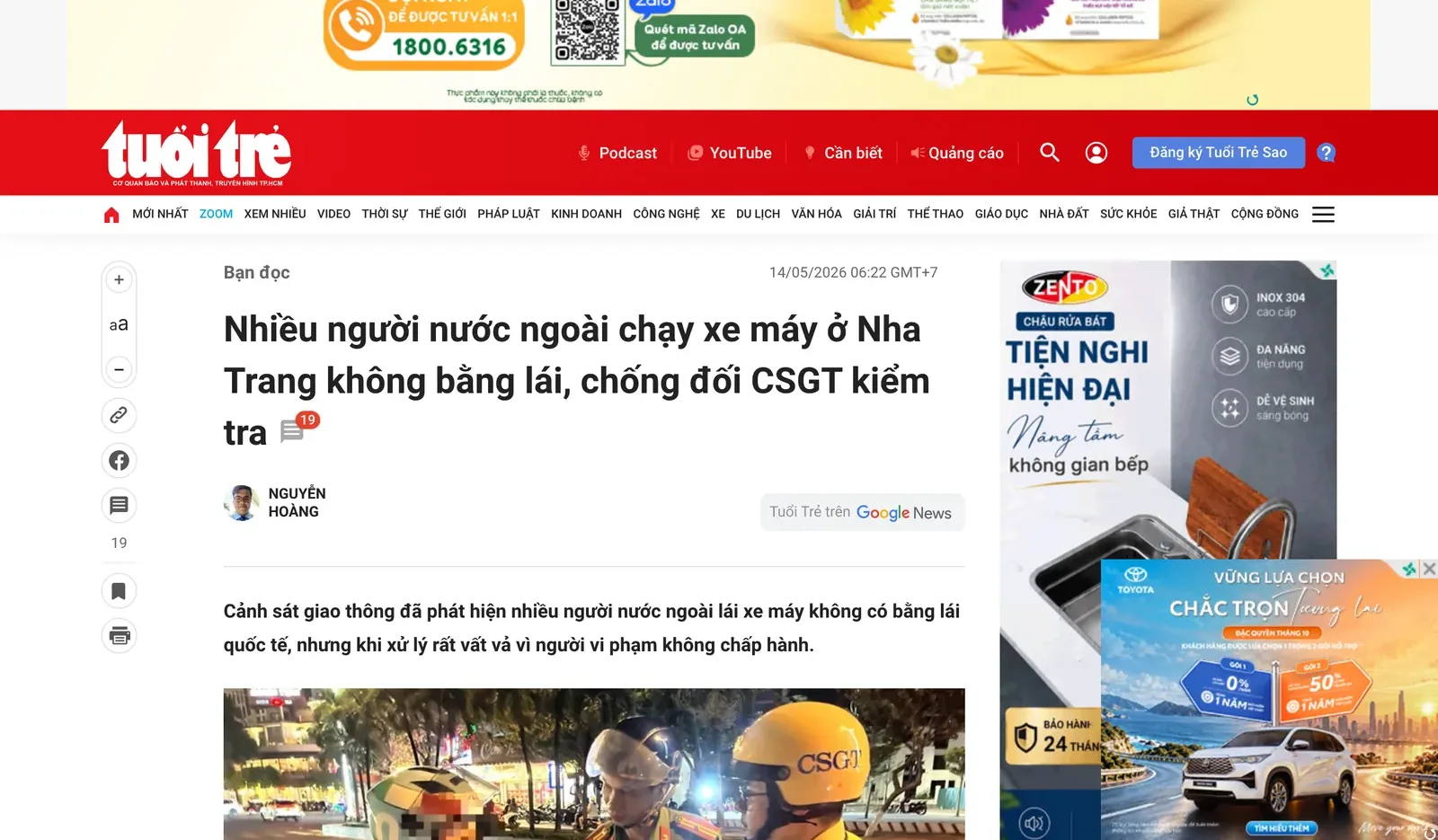 Newspaper web page with the headline about foreigners riding motorbikes in Nha Trang without a licence and a photo of a police check