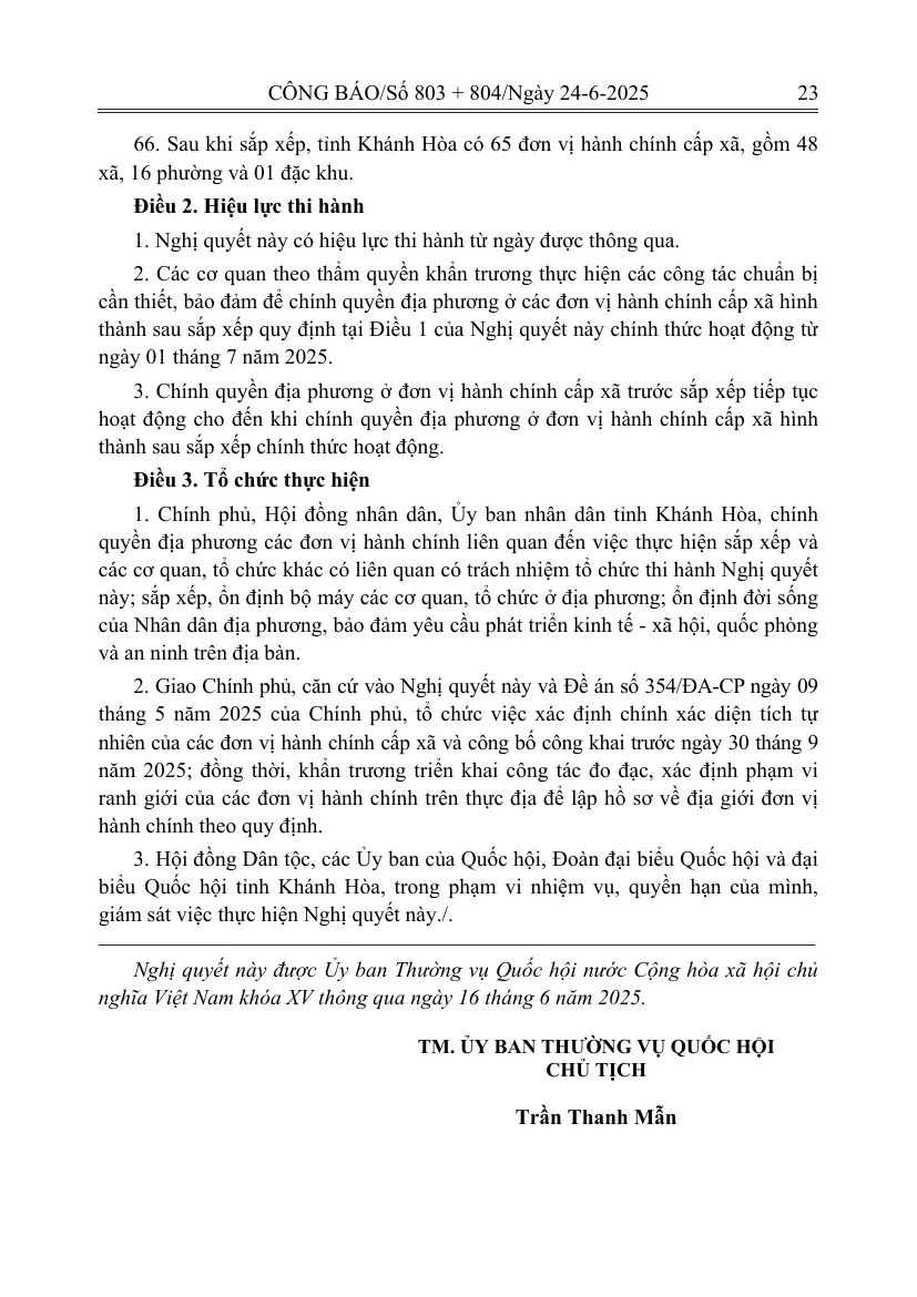 Printed Official Gazette page ending the Standing Committee resolution with the totals of wards and communes in Khanh Hoa and the effective date article
